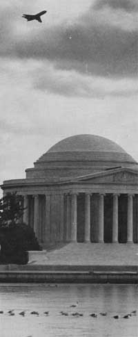 airplane over Jefferson Memorial